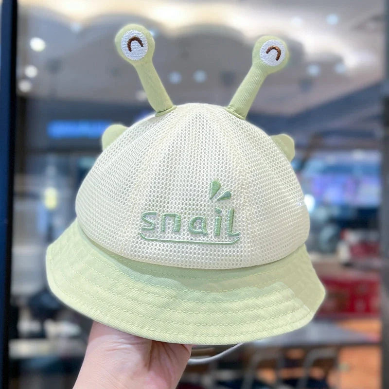 A blue cotton baby bucket hat with a solid colour design to protect your child from harmful UV rays.