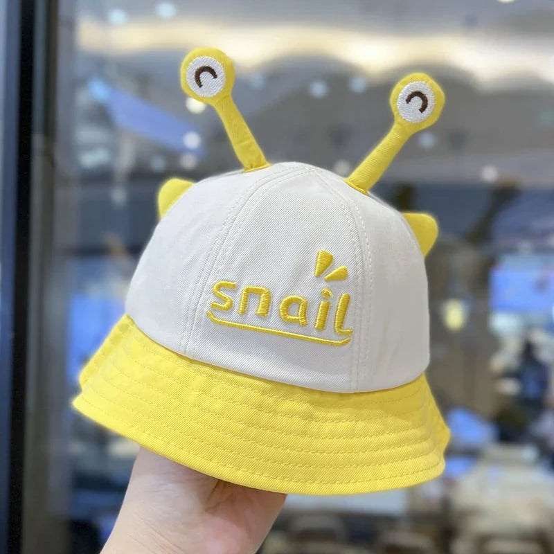 A blue cotton baby bucket hat with a solid colour design to protect your child from harmful UV rays.