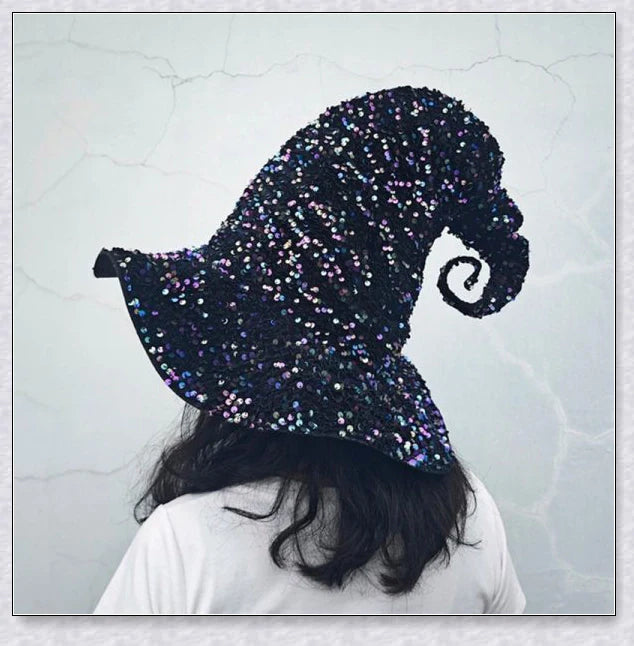A red and multicolour sequin witch hat with an adjustable fit, perfect for Halloween, masquerade, and themed parties