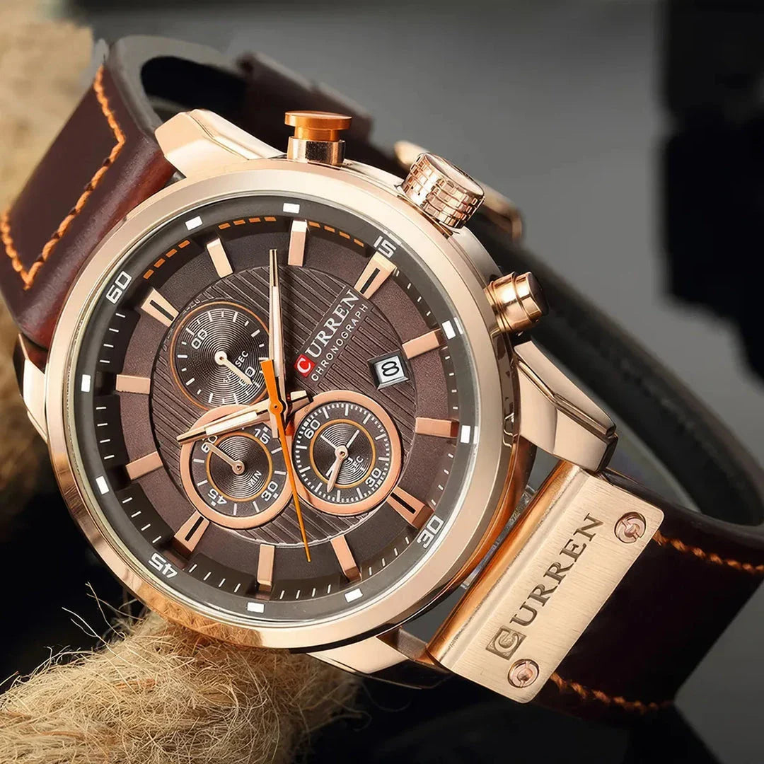 A sophisticated men's leather sports chronograph watch with a sleek round design and multiple sub-dials for enhanced functionality.