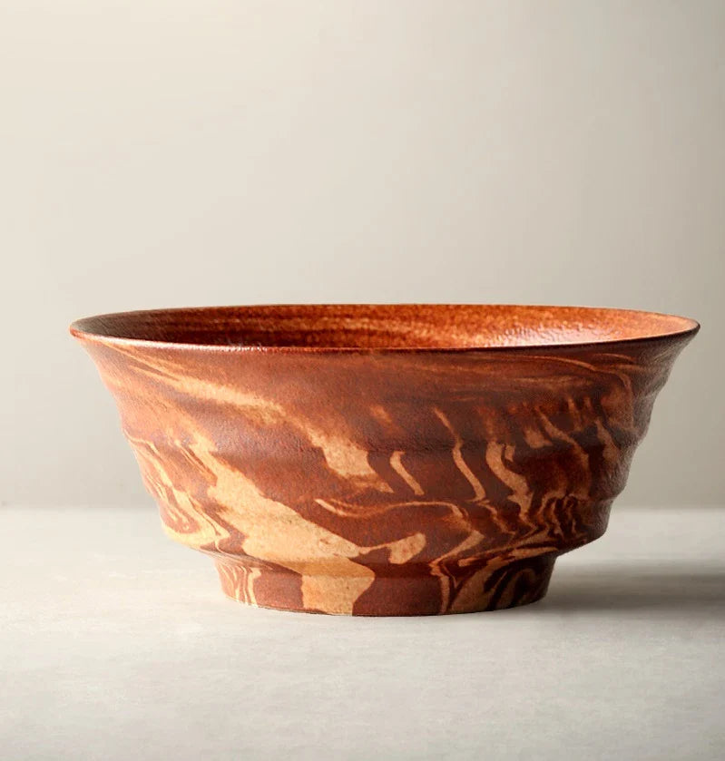 Stylish red ceramic salad bowl with generous capacity for serving a variety of dishes
