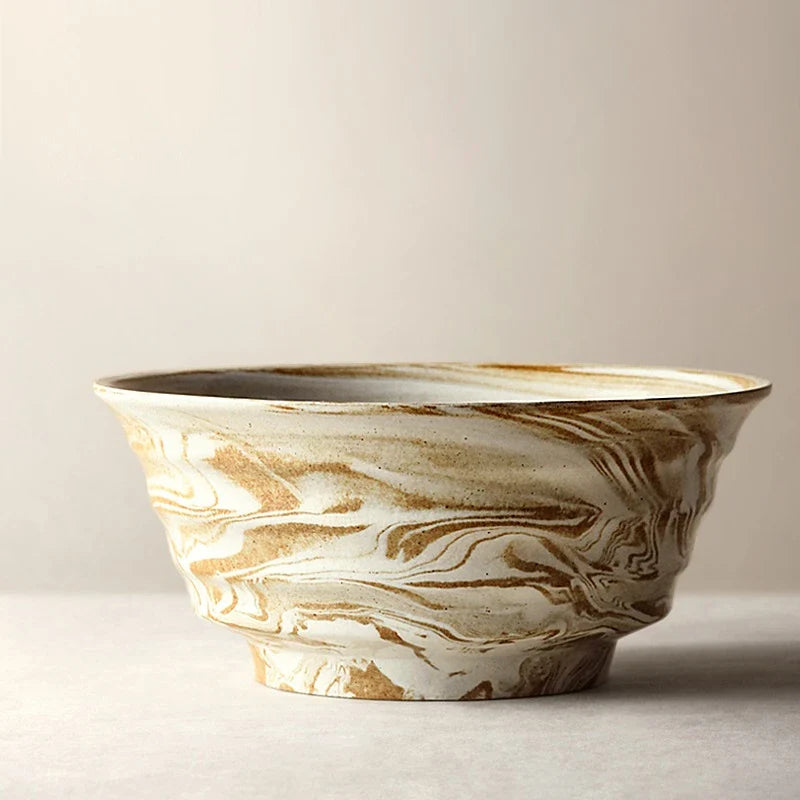 Stylish red ceramic salad bowl with generous capacity for serving a variety of dishes