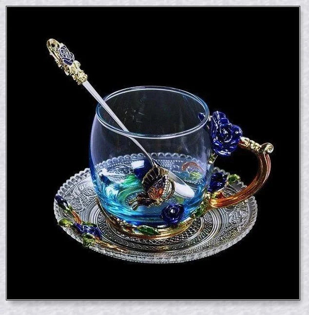 Handmade enamel mug with butterfly and rose designs, complete with golden trimming
