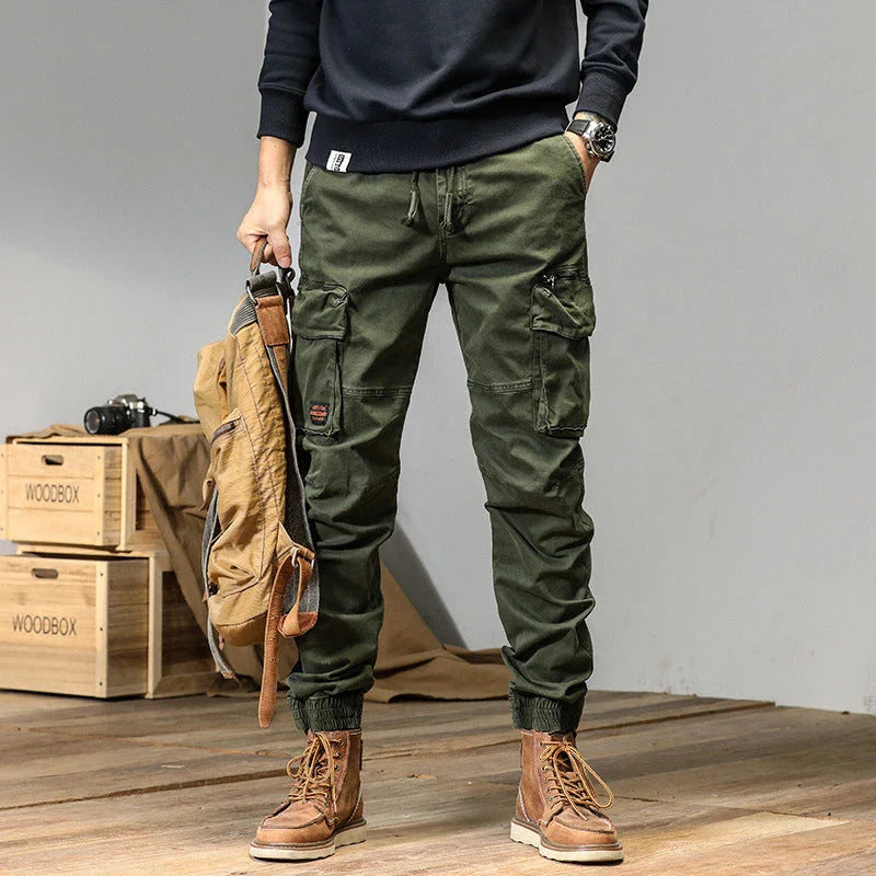 American Straight Multi-pocket Lace Trousers in gray, featuring premium cotton construction and subtle lace accents for a refined British-inspired look.