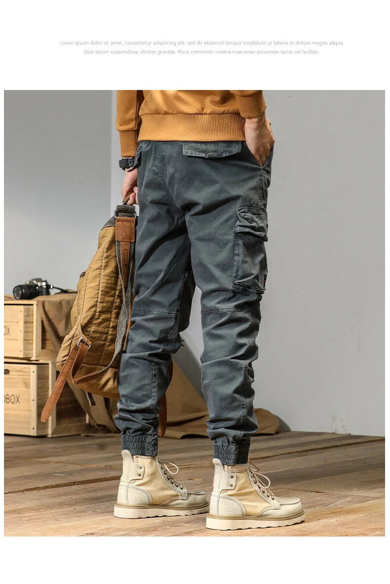 American Straight Multi-pocket Lace Trousers in gray, featuring premium cotton construction and subtle lace accents for a refined British-inspired look.