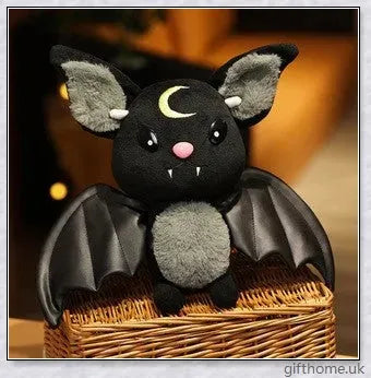 Soft, plush bat toy in purple and black colours, perfect for cuddling or decoration