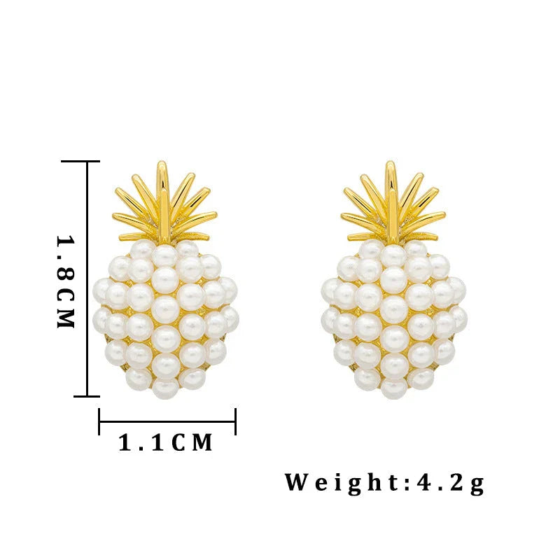 Elegant pearl pineapple stud earrings for women in a white and gold colour scheme