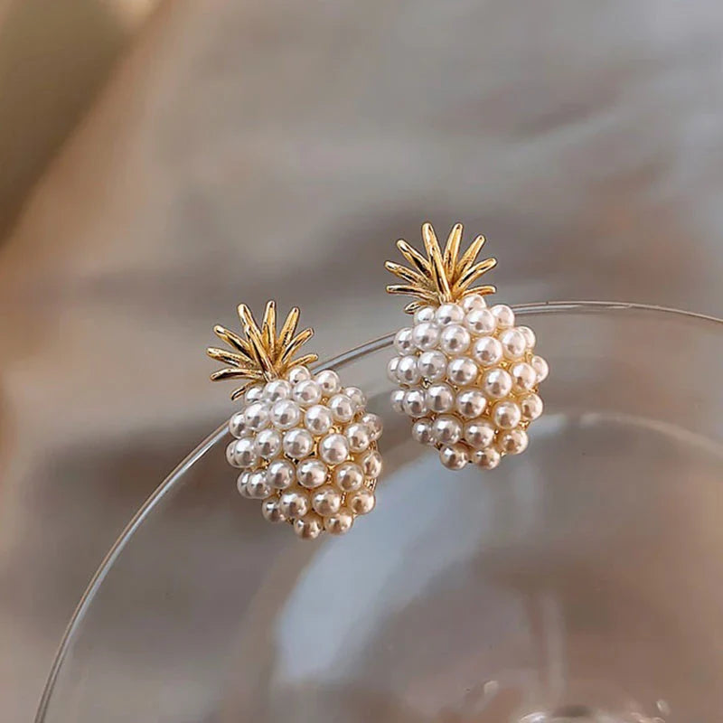 Elegant pearl pineapple stud earrings for women in a white and gold colour scheme