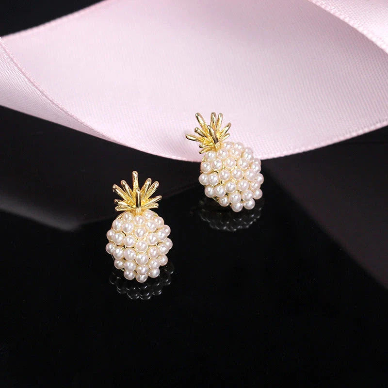 Elegant pearl pineapple stud earrings for women in a white and gold colour scheme
