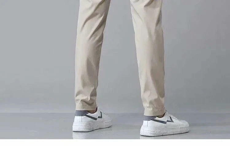 Premium Korean-style drawstring trousers in black, khaki, and dark grey colours, featuring a relaxed, straight-leg silhouette and micro-elastic fabric for comfort and flexibility.