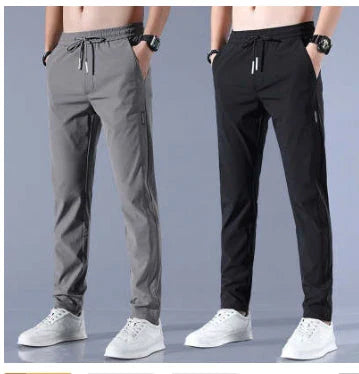 Premium Korean-style drawstring trousers in black, khaki, and dark grey colours, featuring a relaxed, straight-leg silhouette and micro-elastic fabric for comfort and flexibility.