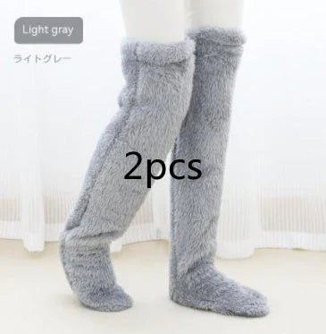 Cozy over-the-knee fuzzy socks in various colors, including brown, blue, dark gray, and pink purple