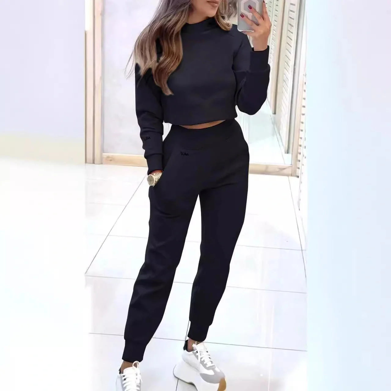 Stylish collared jacket and slim-fit trousers in a variety of colors, perfect for athleisure wear