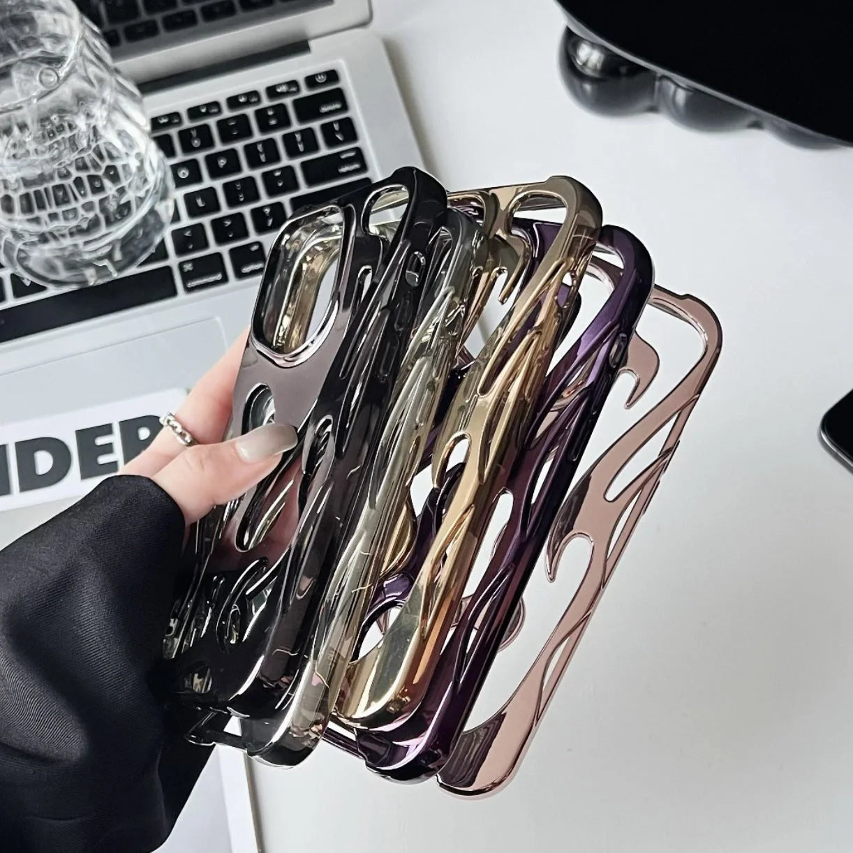 Premium electroplated iPhone case with hollow flame pattern for heat dissipation