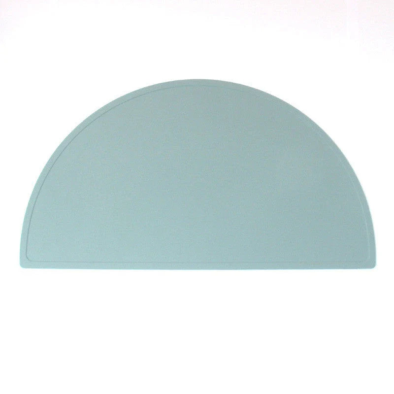 Durable silicone placemat in various colors, featuring waterproof and stain-resistant properties for easy cleaning