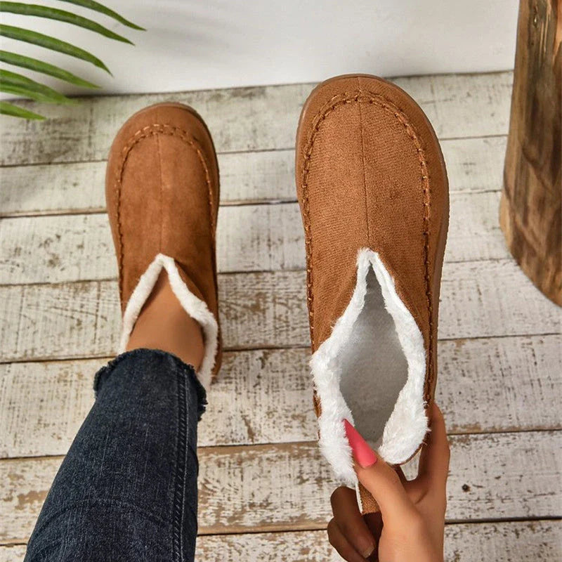 Stylish plush ankle boots with V-cut design, available in dark grey, black, light brown, and milky white colors