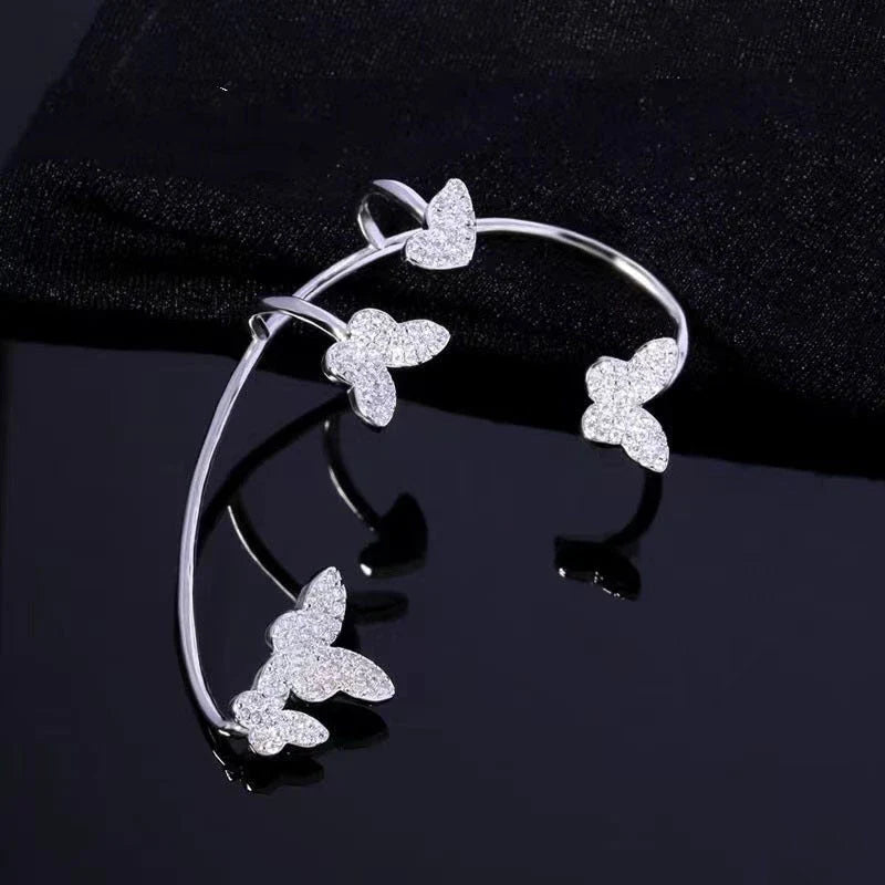 Sparkling butterfly-shaped ear cuffs with zirconia stones, available in gold and silver alloy finishes