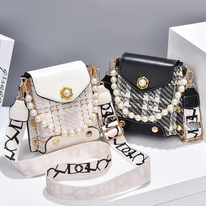 Premium crossbody phone bag with elegant pearl charm, made of durable PU leather and available in multiple color options