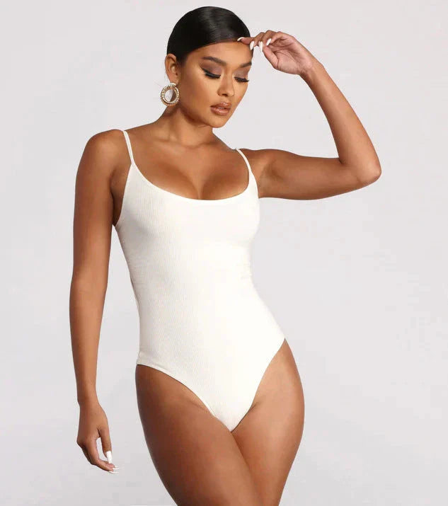 Stylish backless one-piece swimsuit in various vibrant colors for curvy women