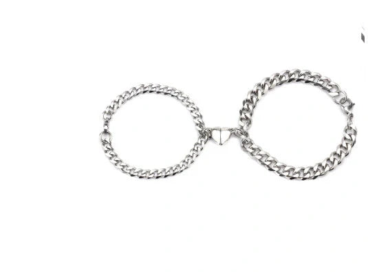 Elegant titanium steel couple bracelets with heart design, perfect for love gifts.