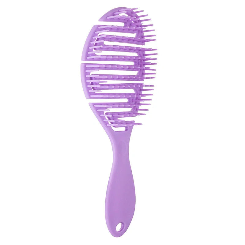 Stylish Massage Comb in various colours offering a soothing scalp massage and modern, minimalist design