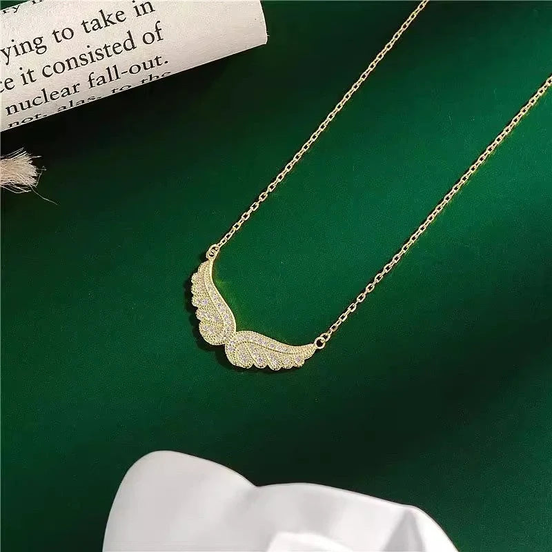 Stunning sterling silver angel wings pendant necklace with cubic zirconia stones