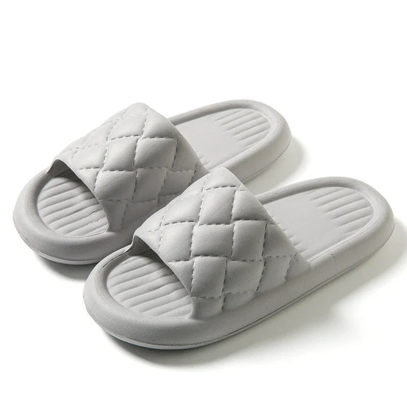 Comfortable and lightweight home slippers with a unique rhombus pattern, waterproof and odor-resistant EVA material, and a non-slip sole for safe indoor wear.