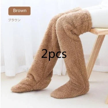 Cozy over-the-knee fuzzy socks in various colors, including brown, blue, dark gray, and pink purple