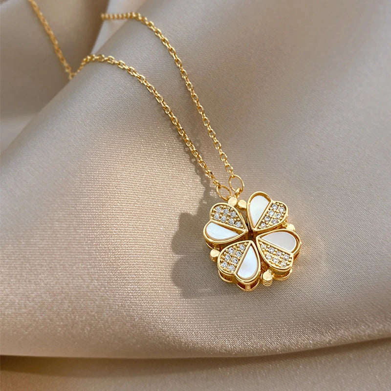 Luxe four-leaf clover pendant necklace crafted with stainless steel and crystal heart charm for women