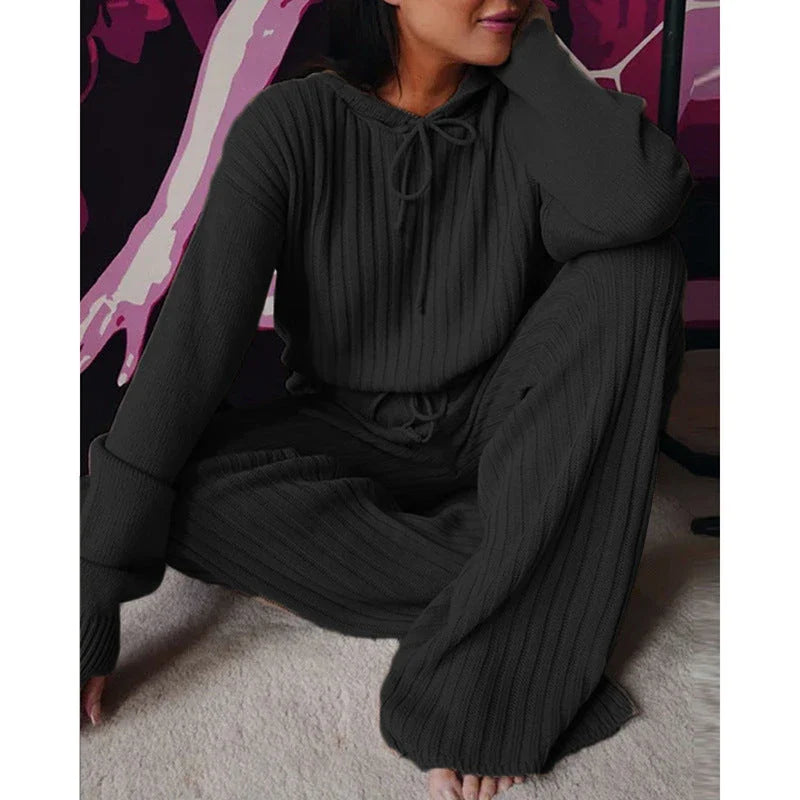 Cozy hooded two-piece loungewear set with soft, stretchy fabric and relaxed silhouette