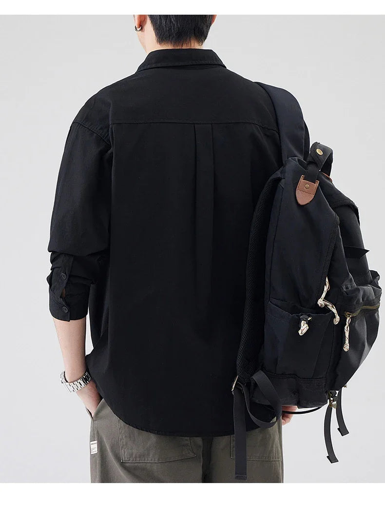 LKTM men's long-sleeved shirt in black, white, and grey colours, featuring a classic American-inspired design and premium cotton construction