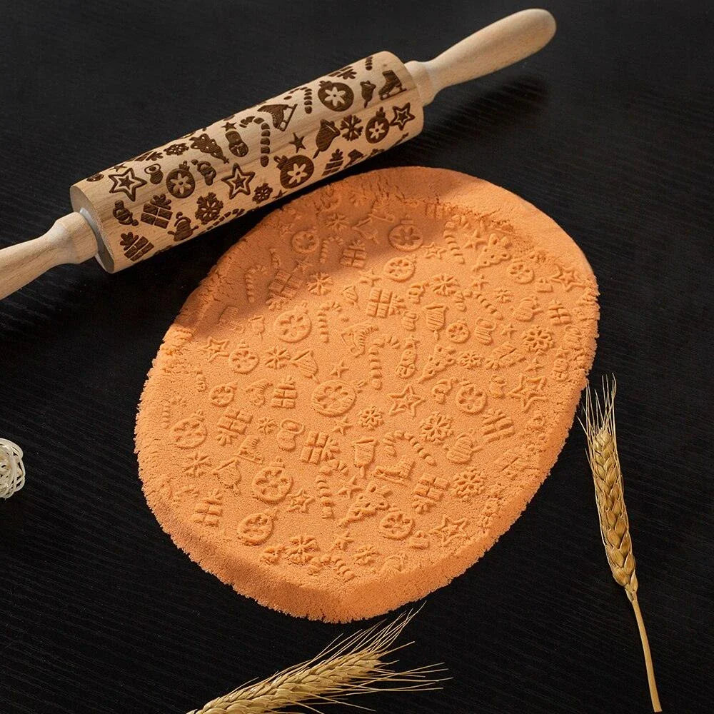 Embossed rolling pin made of natural wood with intricate designs for creating textured baked goods