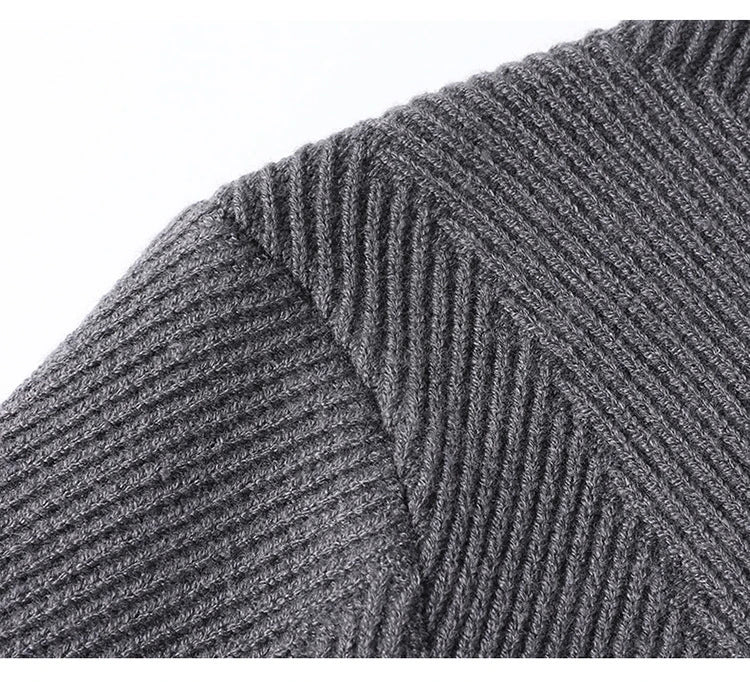A stylish and cosy men's knitted cardigan with a fashionable lapel design, available in a range of classic neutral tones.
