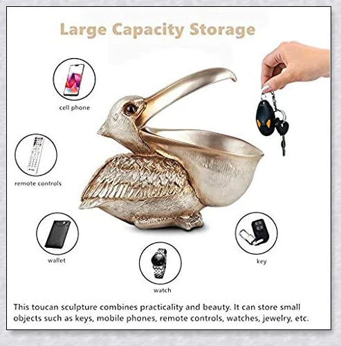 Pelican Storage Figurine, a high-quality resin sculpture with an open mouth design for practical storage and elegant décor.