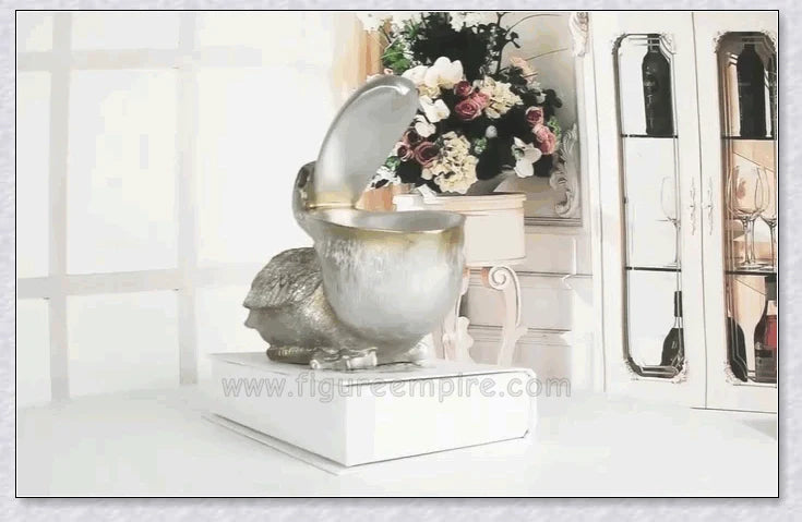 Pelican Storage Figurine, a high-quality resin sculpture with an open mouth design for practical storage and elegant décor.