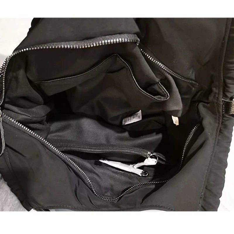 Large black travel bag with ample storage compartments, perfect for weekend getaways and European adventures.