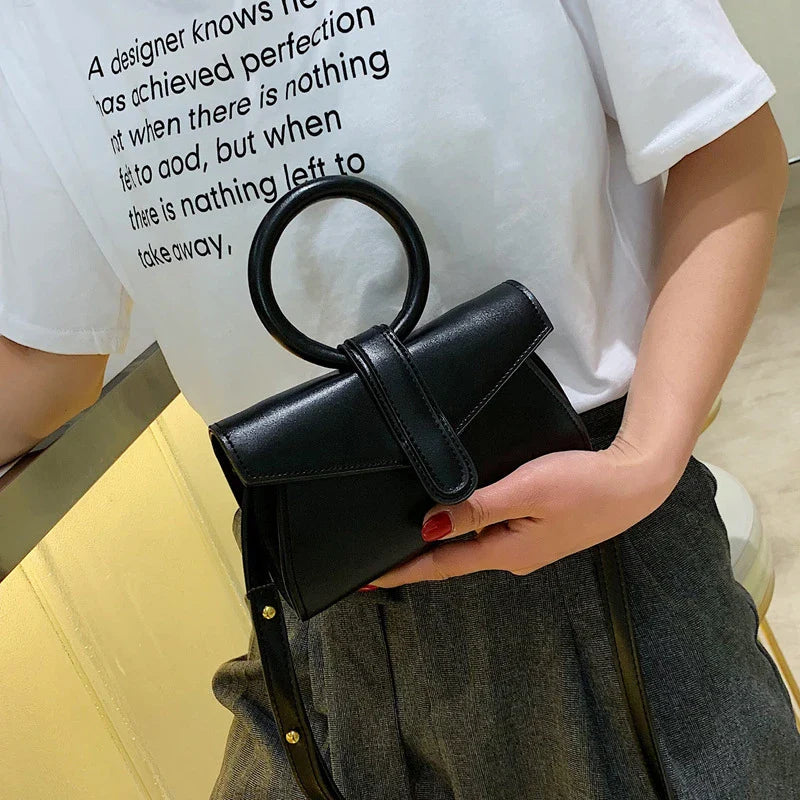 All-Match Messenger Bag in Black - A timeless British accessory with premium materials and versatile design