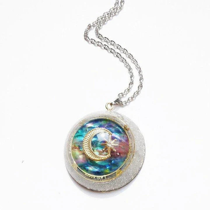 Handmade crystal pendant necklace with a captivating halo effect, a versatile British-made accessory