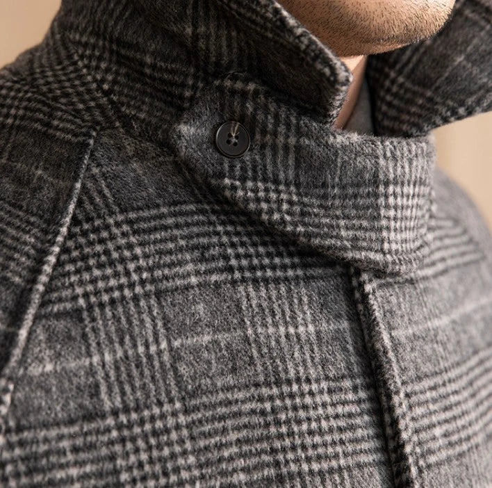 Men's wool-blend mid-length coat in a classic black grey colour, featuring a tailored silhouette and premium details for sophisticated winter style.