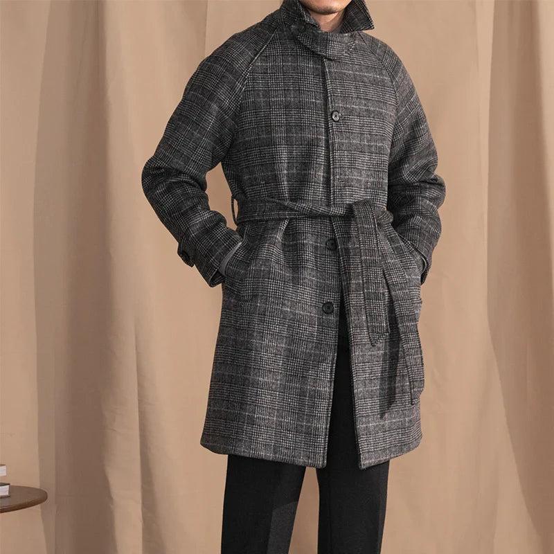 Men's wool-blend mid-length coat in a classic black grey colour, featuring a tailored silhouette and premium details for sophisticated winter style.