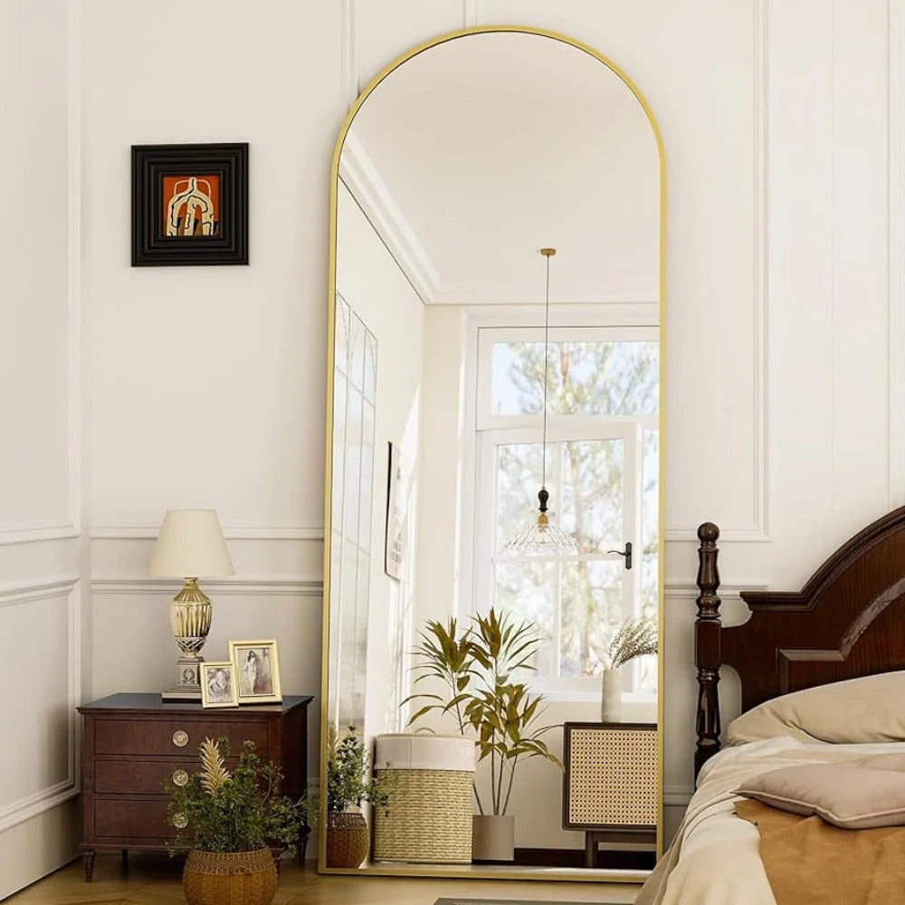 Elegant arched full-length gold mirror with high-definition aluminum frame, providing a clear and accurate reflection for daily use.