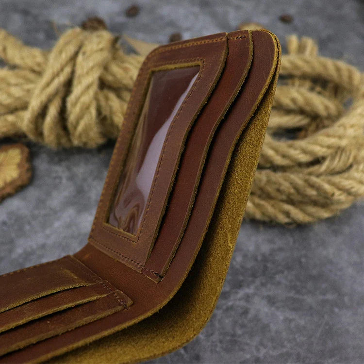 A close-up view of a premium leather wallet in a light brown colour, featuring a single money clip and multiple card slots for organised storage of essentials.