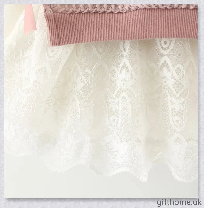 Soft, premium cotton baby girl dress with charming bow detail and cosy corduroy fabric