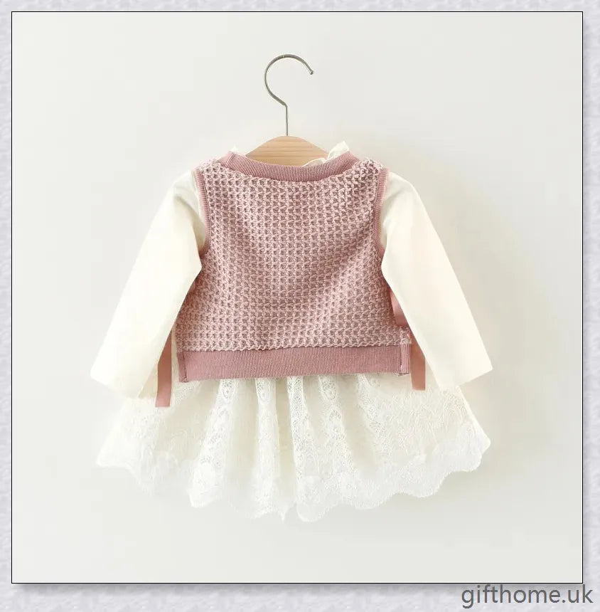 Soft, premium cotton baby girl dress with charming bow detail and cosy corduroy fabric