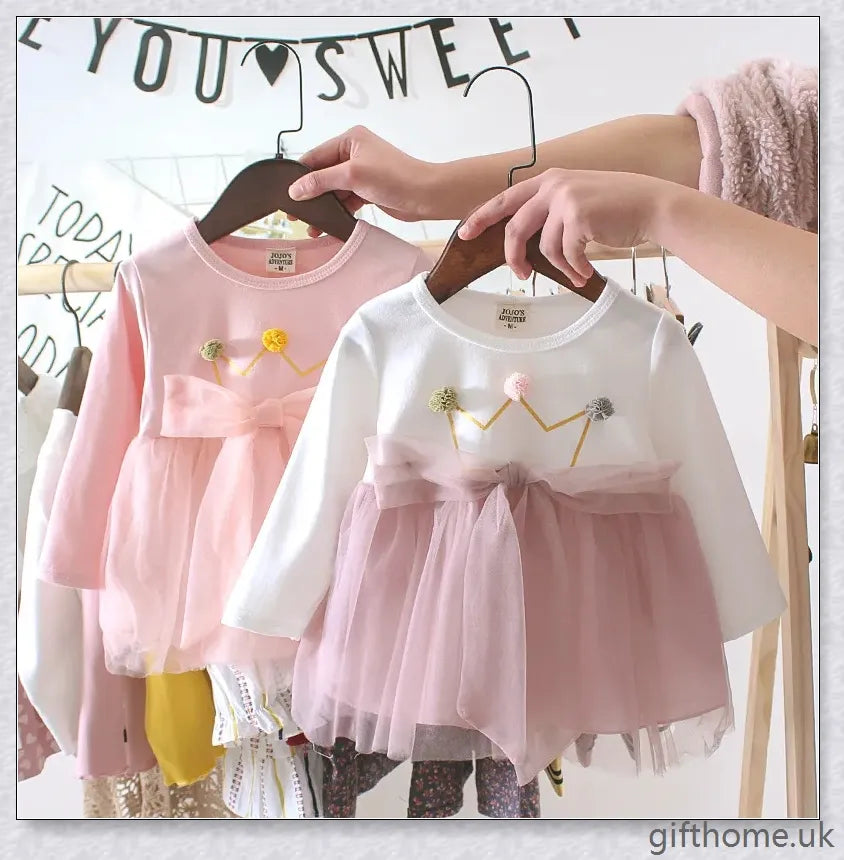 Soft, premium cotton baby girl dress with charming bow detail and cosy corduroy fabric