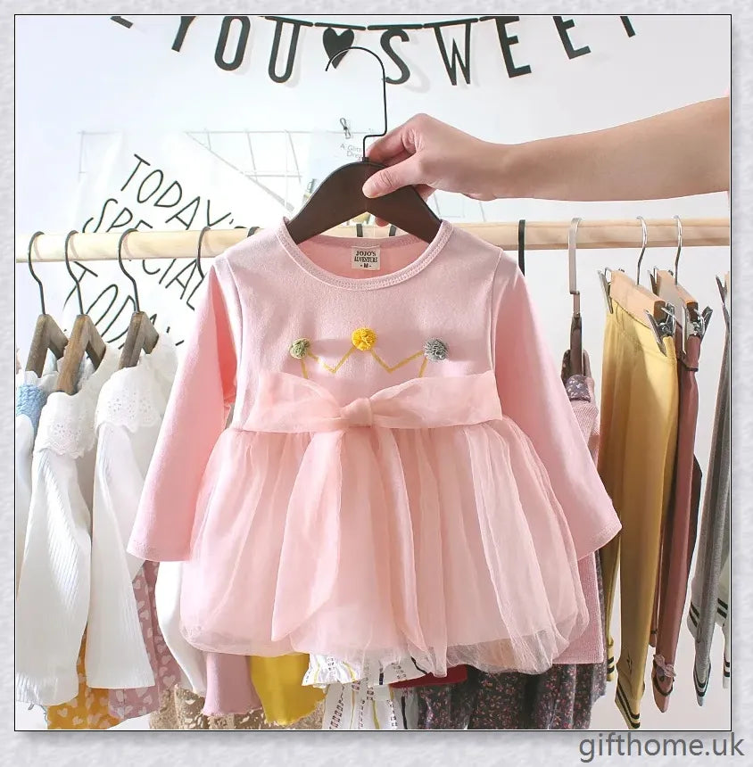 Soft, premium cotton baby girl dress with charming bow detail and cosy corduroy fabric