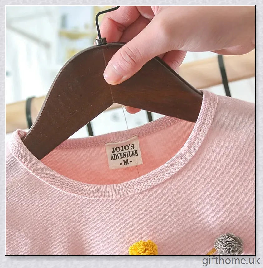 Soft, premium cotton baby girl dress with charming bow detail and cosy corduroy fabric
