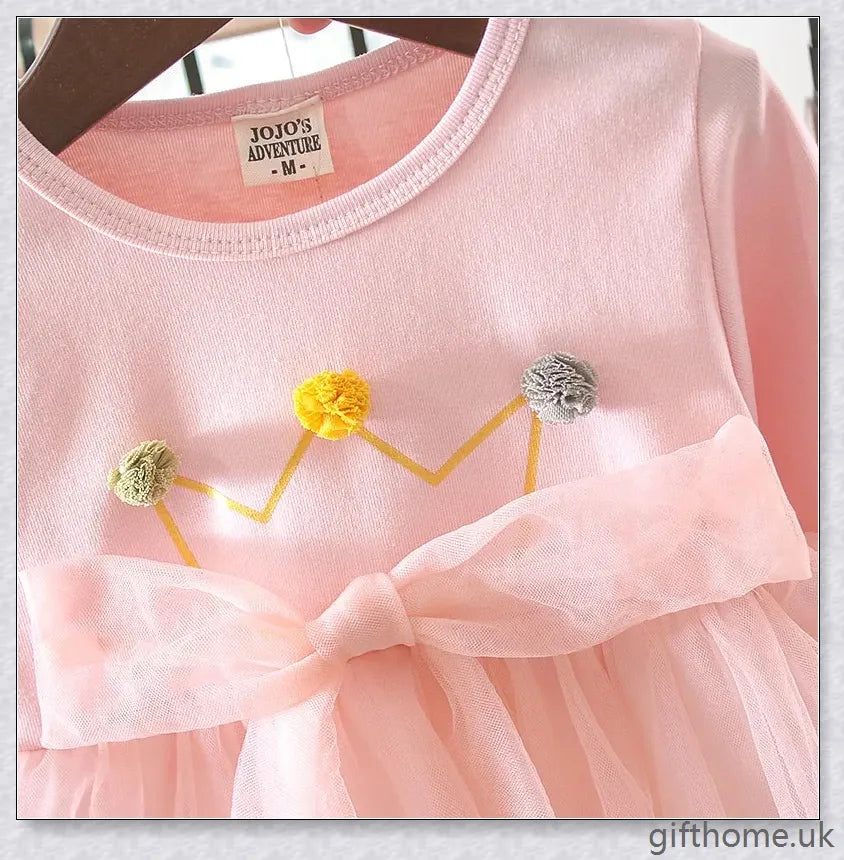 Soft, premium cotton baby girl dress with charming bow detail and cosy corduroy fabric