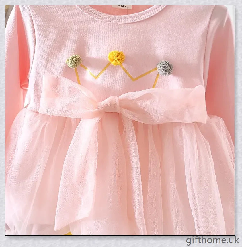 Soft, premium cotton baby girl dress with charming bow detail and cosy corduroy fabric