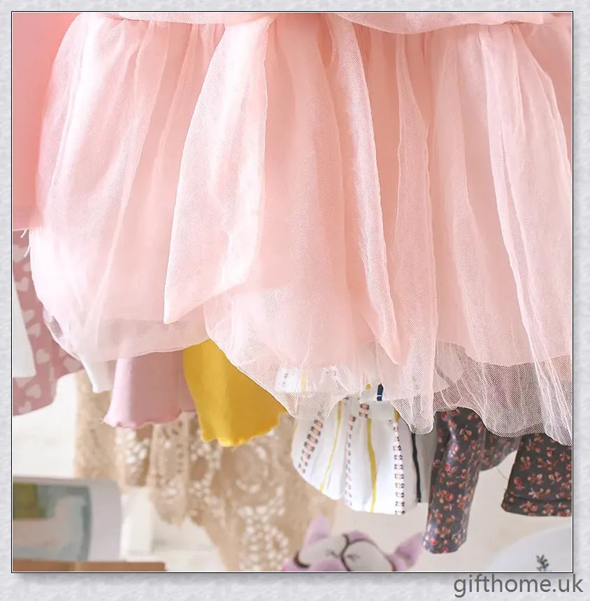 Soft, premium cotton baby girl dress with charming bow detail and cosy corduroy fabric
